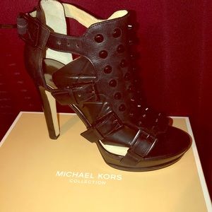 Black studded Michael Kors heel.
